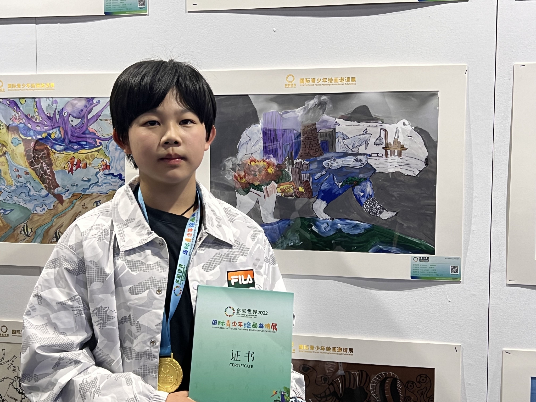 12岁的李鹏宇的作品《物种保护》在绘画展中获得一等奖。新京报记者 陈璐 摄